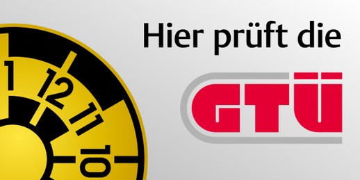 Hinweisschild: Hier prüft die GTÜ